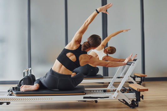 Wood vs. Aluminum Pilates Reformer: A Side-by-Side Comparison